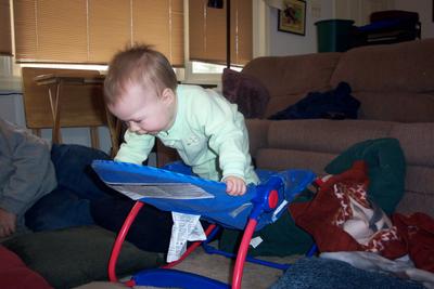 Sarah climbing over rocker