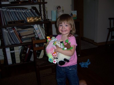 Sarah and lots of toys.